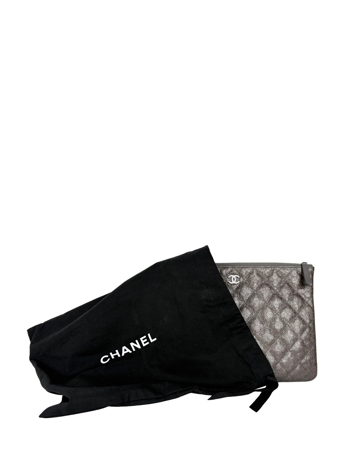 Chanel Medium O-Case in quilted camellia-embossed leather