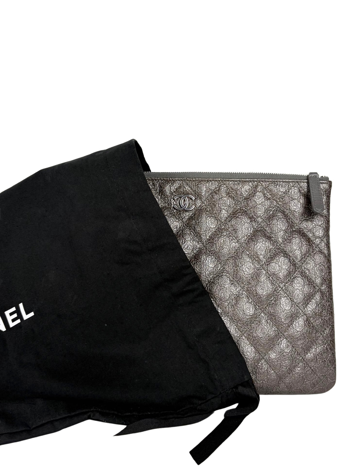 Chanel Medium O-Case in quilted camellia-embossed leather