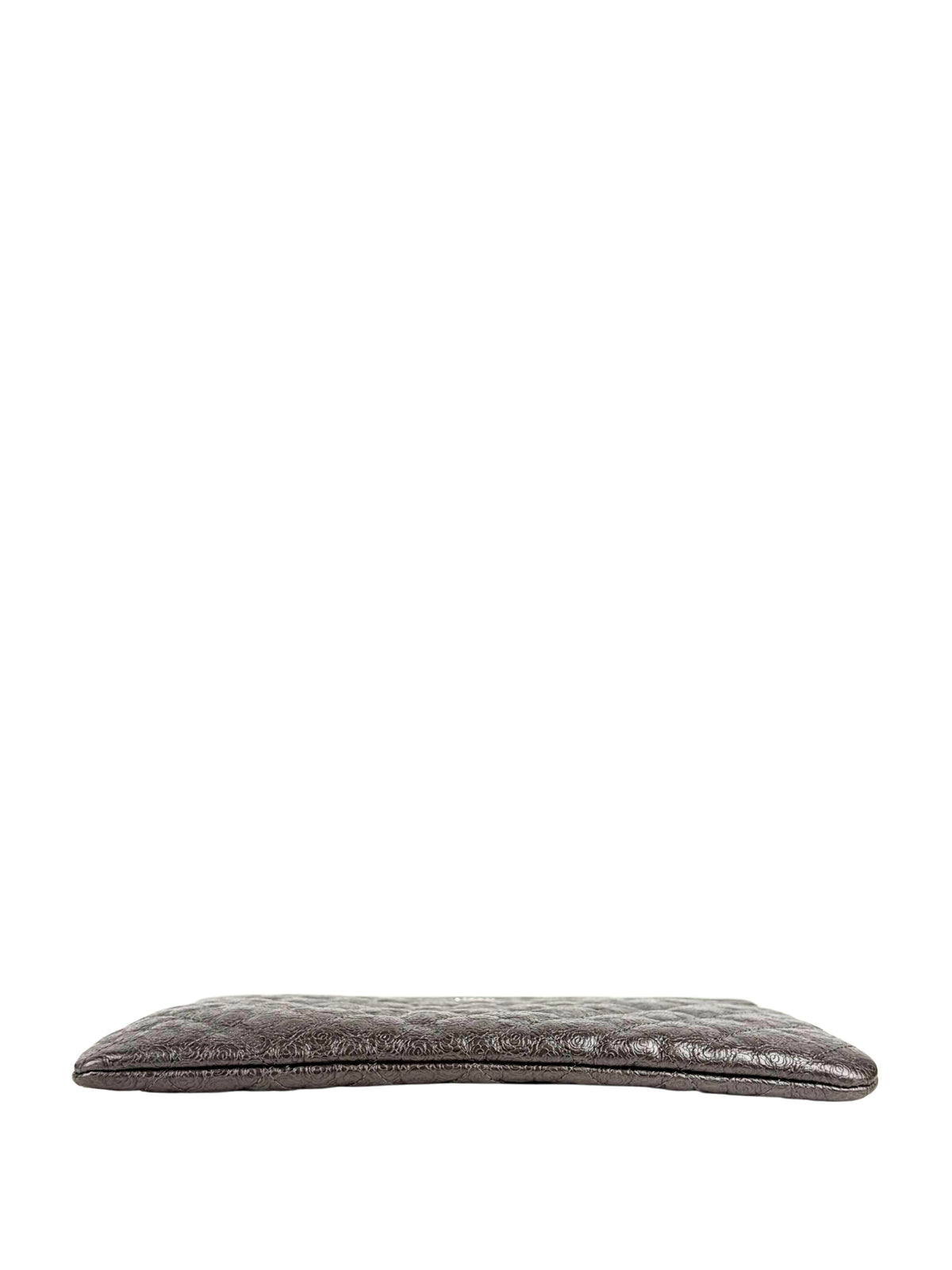 Chanel Medium O-Case in quilted camellia-embossed leather