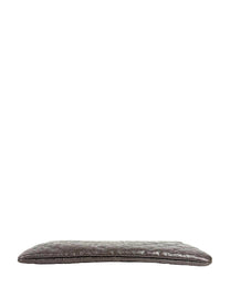 Chanel Medium O-Case in quilted camellia-embossed leather