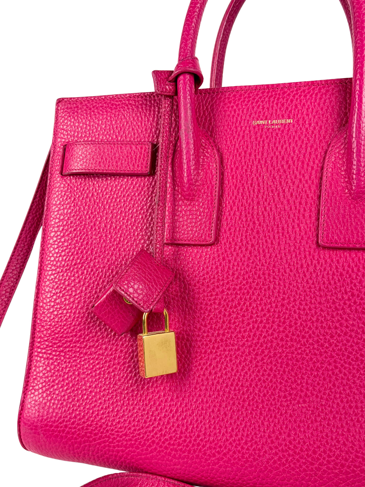 Close-up of the clochette and gold-tone padlock