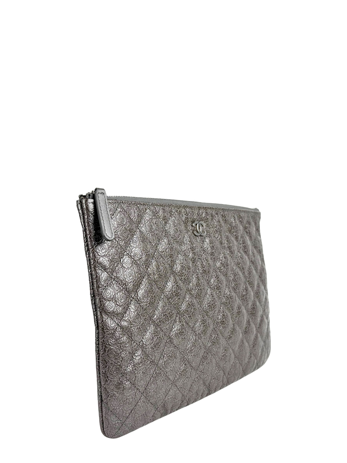Chanel Medium O-Case in quilted camellia-embossed leather