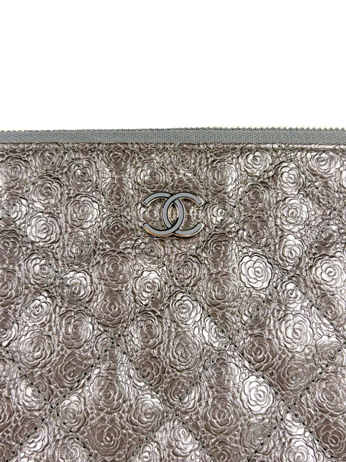 Chanel Medium O-Case in quilted camellia-embossed leather