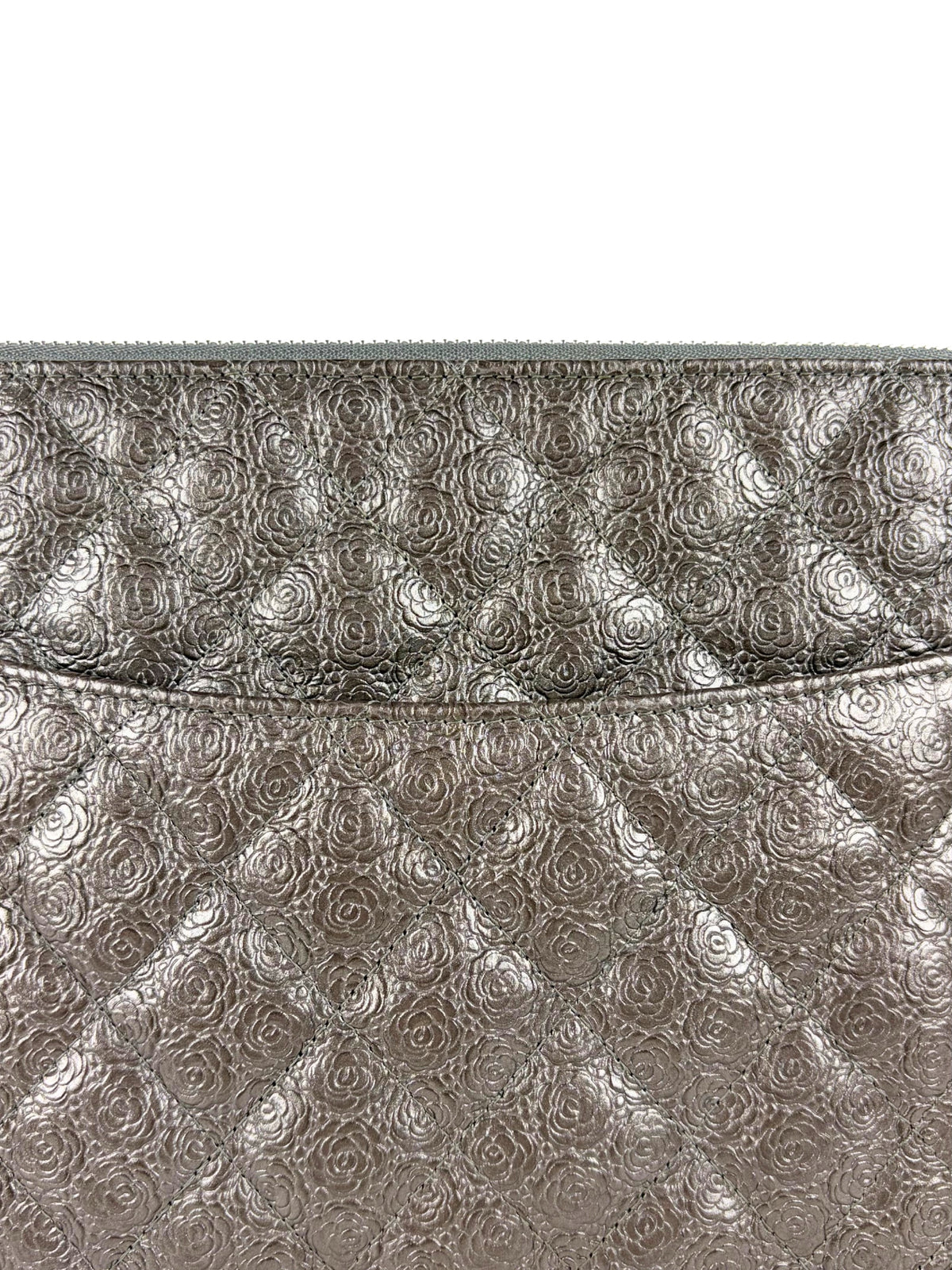 Chanel Medium O-Case in quilted camellia-embossed leather